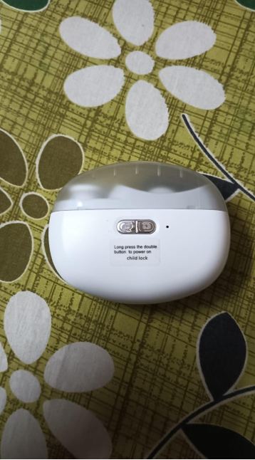 Customer using electric nail trimmer